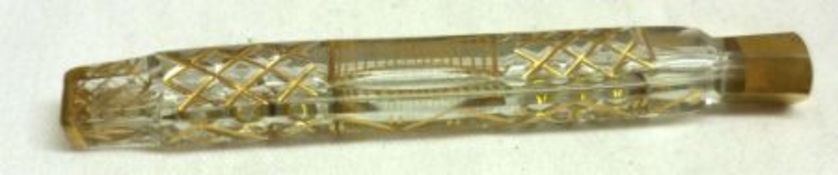 A Georgian cut glass Scent Phial, with gilt lattice work decoration and ends, 4 ½” long, (no