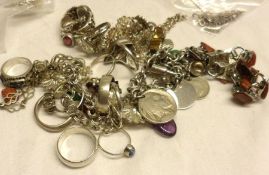 An assortment of white metal Jewellery, including Charm Bracelet and others, numerous Rings (qty)
