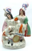 A Staffordshire Flatback Figure Group of a Scots couple with dog