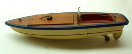 K Models made in Germany, clockwork Motorboat with yellow painted wooden hull and mahogany deck,