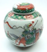 An Oriental Ginger Jar of baluster form, decorated predominantly in famille verte and iron red