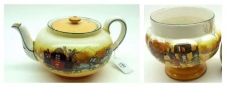 A Royal Doulton Coaching Scene Teapot and similar Pedestal Bowl, 4” and 6” high respectively (2)