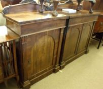 A Victorian Rosewood Sideboard with carved pediment to back, single frieze drawer, two doors with