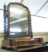 A Victorian Mahogany Dressing Table Mirror, the shaped rectangular mirror plate supported on