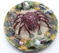 A 20th Century Portuguese Majolica Circular Plate, decorated in the grotesque manner with