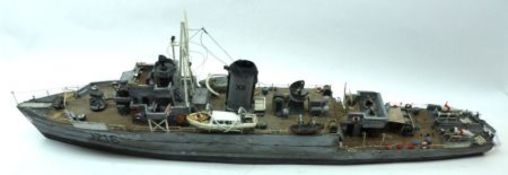 A scratch-built Model of HMS Espiegle Minesweeper, grey painted hull and detailed top deck, length