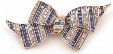 A good quality 20th Century precious metal Bow design Brooch, set with bands of small Sapphires
