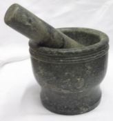 A large Marble Pestle and Mortar of circular baluster form, 7” diam