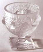 A 20th Century Lalique Pedestal Vase, the frosted bowl embossed with birds and foliage, the base