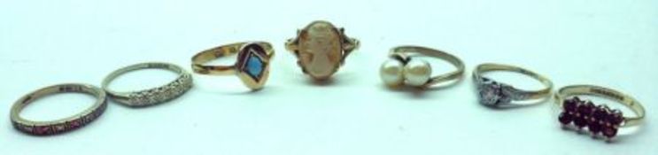 A Mixed Lot comprising: A cased Victorian 22ct Gold Ring, set with a small turquoise stone to an