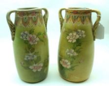 A pair of 20th Century Satsuma Spill Vases of two-handled spreading circular form, decorated in