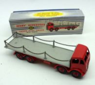 Dinky Supertoys No 905 Foden Flat Truck with Chains, in red and grey livery, raised on 8 wheels with