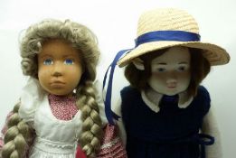 Two late 20th Century Character Dolls, one carved wood example with painted features, long