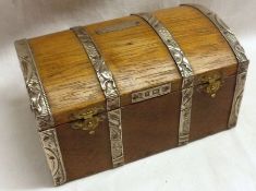 An unusual Edwardian Oak Jewellery Casket in the form of a Ships Trunk, with inscribed panel to