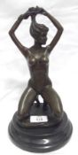 After Jean Poitou, patinated Bronze Study of a Naked Female Dancer, on a black slag socle, 11 ½”