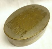 An Oriental mixed metals oval Snuff Box, with hieroglyphics to the lid, slate and copper lined