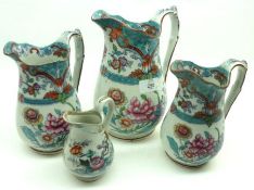 A graduated set of four 19th Century Stoneware Jugs, marked Till & Sons, No 18 to bases, (several