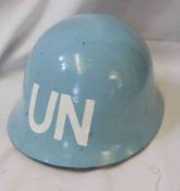 UN Blue and White Tin Helmet with leather chin strap