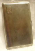 A George VI large rectangular Cigarette Case, engine turn decorated with chamfered edges,