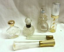 A collection of six assorted 20th Century Scent Bottles including a small circular cut glass example