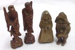 A small Collection of Carved Treen Figures comprising: A Fisherman and Wife and two further Oriental