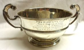 An Edwardian small Presentation Rose Bowl of circular form, with raised body band, leaf capped
