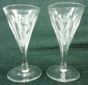 A set of six decorative early 20th Century small trumpet bowled Glasses, facetted and etched with