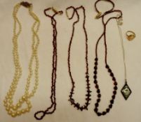 A packet of assorted Jewellery items including three Garnet Bead Necklaces, cased Bracelet, paste