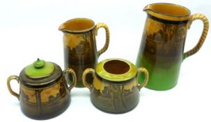 A Mixed Lot: Royal Doulton Wares decorated with landscape scenes: two Graduated Jugs, two 2