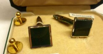 A mid-20th Century cased pair of mixed metals and Bloodstone Cufflinks, together with two yellow