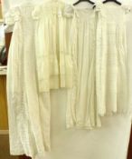 A quantity of late 19th/early 20th Century white Cotton embroidered Baby’s Christening Gowns, also