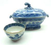 A 19th Century Blue and White Lidded Sauce Tureen, 7” long; together with a further 19th Century