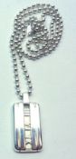 A Tiffany & Co hallmarked Silver Ingot style Pendant and Chain, stamped “Atlas © 2003 Tiffany & Co.