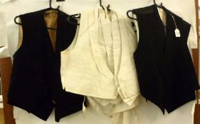 Four Vintage black Wool Gentleman’s Waistcoats, together with a quantity of white Evening Dress