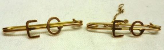Two unmarked yellow metal Bar Brooches, each with the raised initialled “E G”, weighing in total