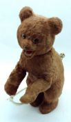 Russian early 20th Century, mid-brown plush-covered Clockwork Dancing Bear, height 10 ½”