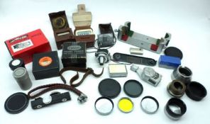 A small collection of mostly Leica parts and accessories, to include: Nickel Base Plates, Frame