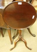 A small late 19th Century Mahogany Wine Table, the round snap top to a turned column and tripod