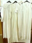 A late 19th/early 20th Century collection of white work Cotton Ladies Nightdresses, most with