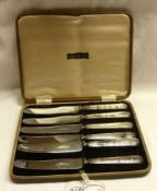 A cased set of six Stainless Bladed and Silver-handled Cake Knives (A/F)