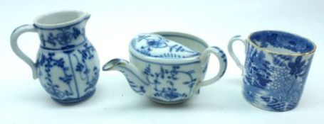 A small Blue and White Coffee Can with gilded rim; together with a Continental Blue and White