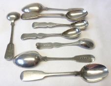 A heavy set of three Georgian/Victorian Mustard Spoons with hourglass shaped handles, each bearing a