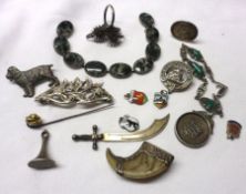 A packet of assorted Silver and white metal Jewellery, including Tiger’s Claw Brooch, Seal, Dog