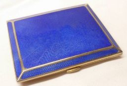 An Art Deco period gilt metal and blue enamelled Cigarette Case, rectangular shape, 3 ¾” x 3” (
