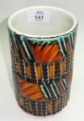 A Poole Pottery Cylinder Vase, decorated with an abstract design in colours, 6” high