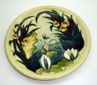 A Modern Moorcroft Circular Plates, circa 1995, decorated in colours with a bulrushes type design on