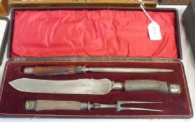 A Victorian leather cased Three Piece Carving Set, with horn handles, the knife stamped “Kay & Co,