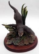 A Border Fine Arts Group “Ebb and Flow”, on a treen base, 10” high