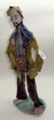 An unusual Capodimonte style Figure of a Peddler, painted in colours throughout (losses), 19” high