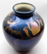 An unusual early 20th Century Pottery Large Baluster Vase, decorated in iridescent colours with